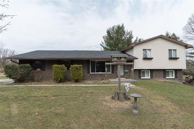 front view picture of 13310 Harper Drive, Chelsea, MI. 48118