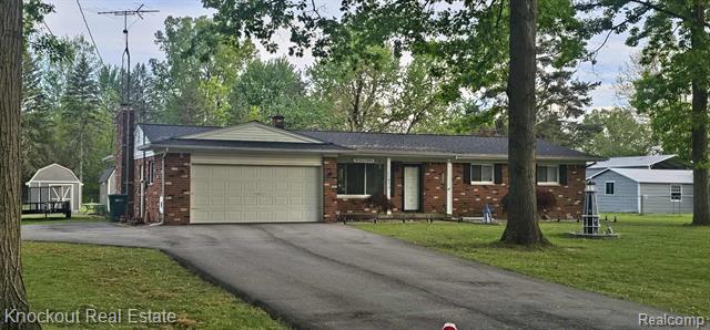 front view picture of 11870 Woodland, Lennon, MI. 48449