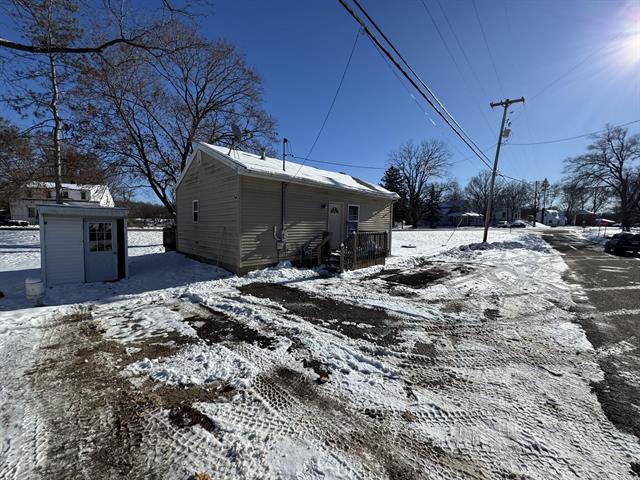 front view picture of 418 S Main Street, Leslie, MI. 49251