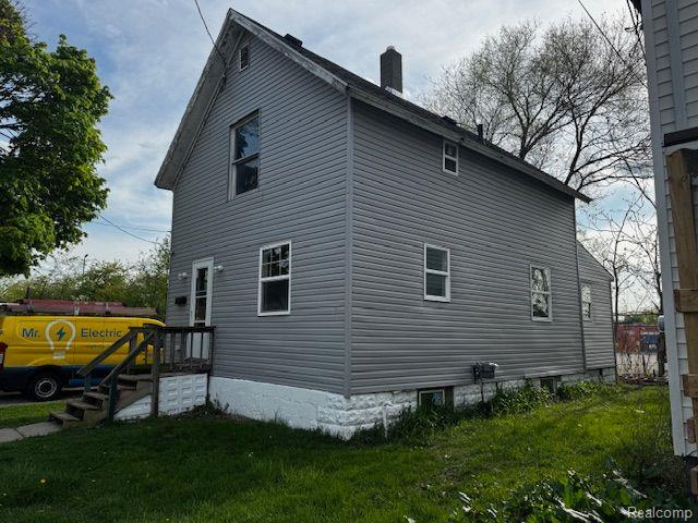 front view picture of 1143 Ballard Street, Lansing, MI. 48906