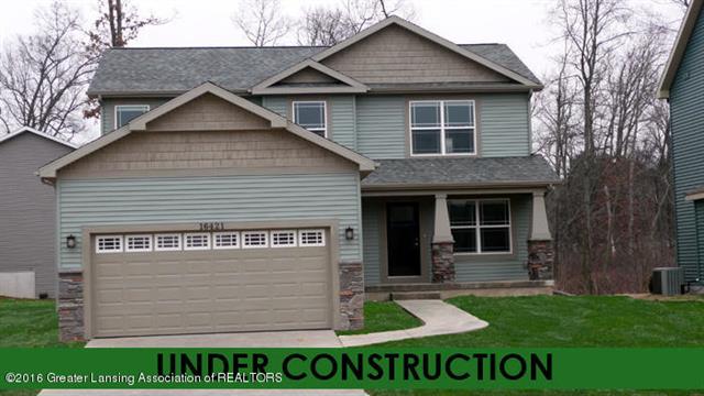 front view picture of 446 Hickory Bluff Lane, Chelsea, MI. 48118