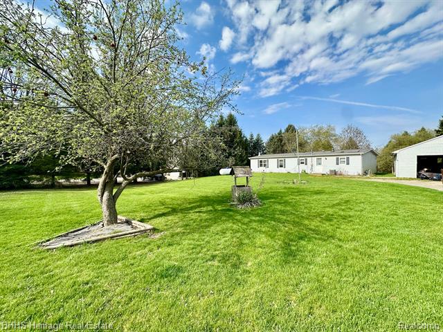 front view picture of 1088 Kern Road, Fowlerville, MI. 48836