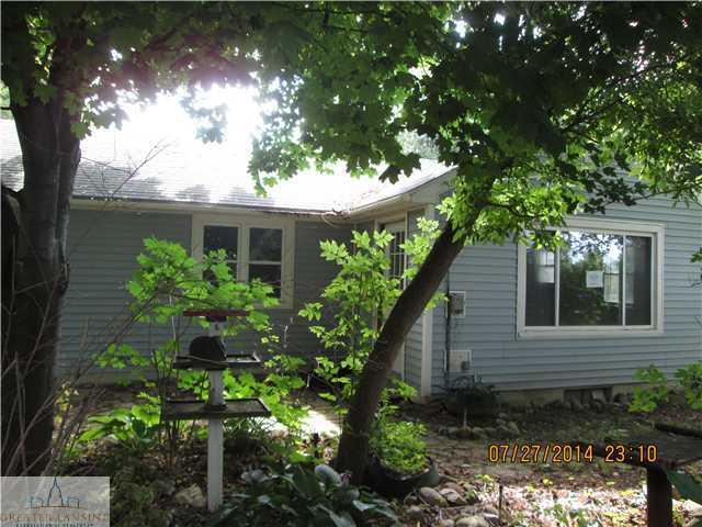 front view picture of 3048 N Webberville Road, Webberville, MI. 48892