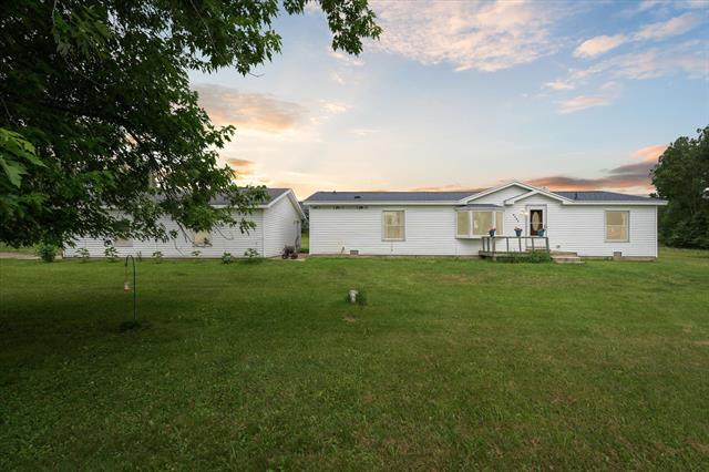 front view picture of 4767 Haslett Road, Perry, MI. 48872
