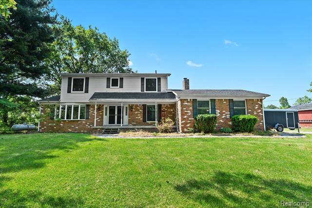 front view picture of 3757 Chase Lake Road, Howell, MI. 48855