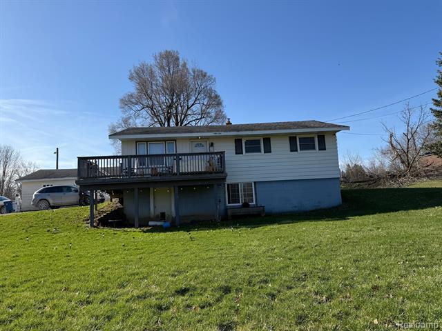 front view picture of 10300 Farrand Road, Otisville, MI. 48463