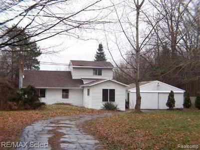 front view picture of 7174 N Center Road, Mount Morris, MI. 48458