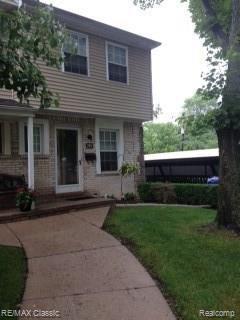 front view picture of 205 Riveroaks, Plymouth, MI. 48170