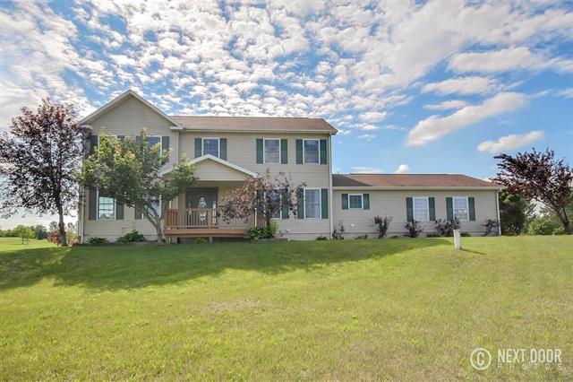 front view picture of 2421 N Burgett Lane, Grass Lake, MI. 49240