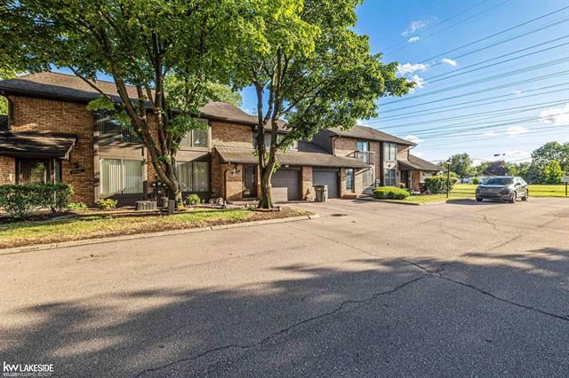 front view picture of 37143 Clubhouse Drive, Sterling Heights, MI. 48312