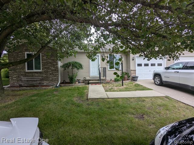 front view picture of 730 Channel Drive, Marine City, MI. 48039