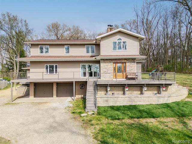 front view picture of 175 Templar Avenue, Pinckney, MI. 48169