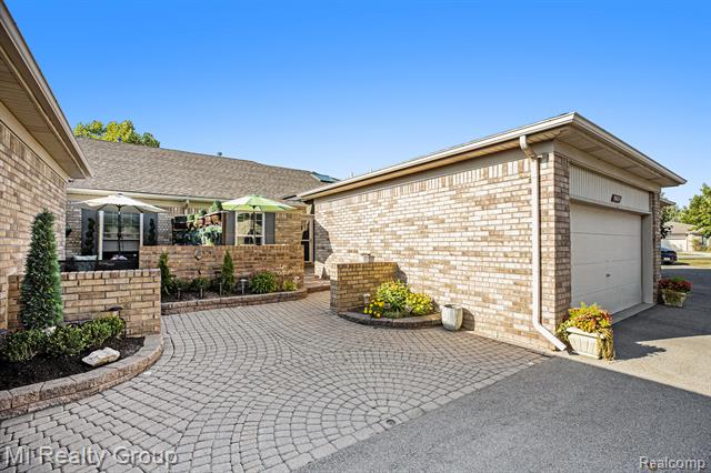 front view picture of 50317 Highpoint Court, Macomb, MI. 48044
