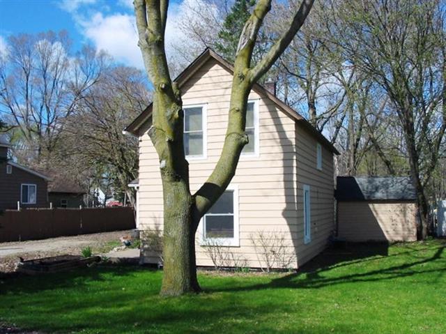 front view picture of 8908 Augusta Street, Willis, MI. 48191
