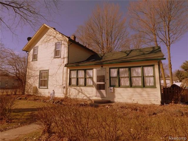 front view picture of 303 N 4Th Street, Brighton, MI. 48116