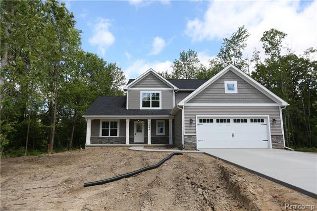 front view picture of 1084 Woods Edge Drive, Hartland, MI. 48353