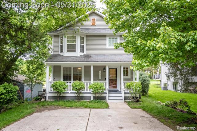 front view picture of 7457 Ore Lake Rd, Brighton, MI. 48116