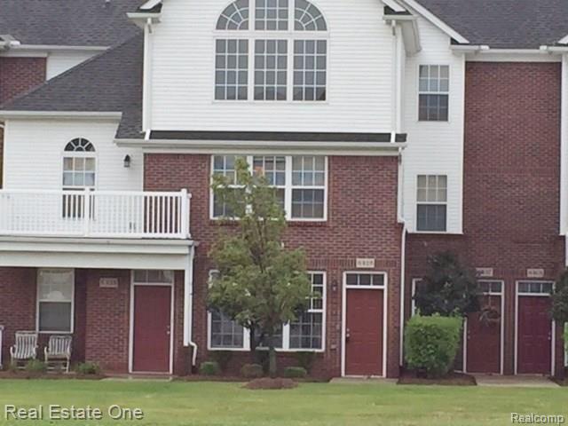 front view picture of 8483 Towne Centern  Circle, Warren, MI. 48093