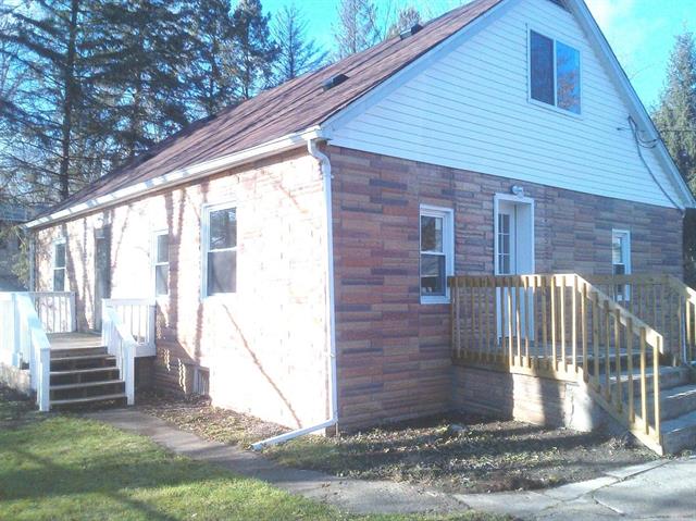 front view picture of 405 Six Mile Road, Whitmore Lake, MI. 48189