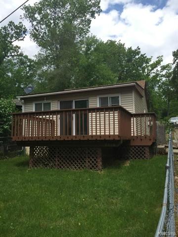 front view picture of 6316 Oakdale, Brighton, MI. 48116