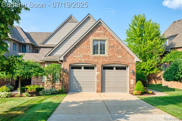 front view picture of 10827 Sparkling Waters Court, South Lyon, MI. 48178