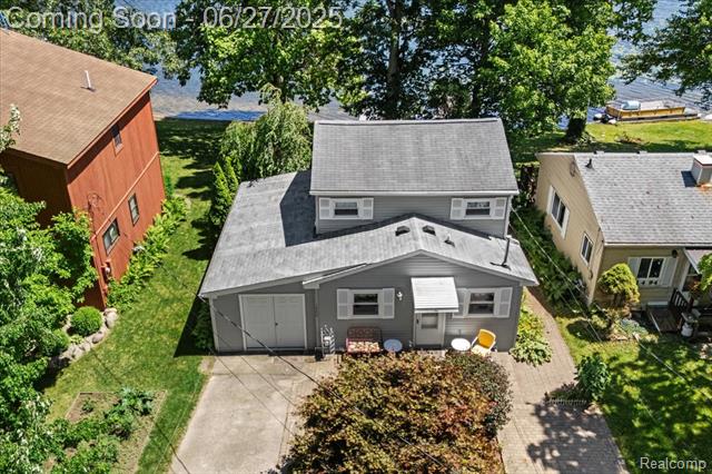 front view picture of 1500 Clark Lake Road, Brighton, MI. 48114