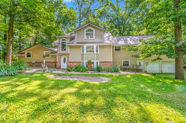 front view picture of 1391 S Lake Wilson Rd, Hillsdale, MI. 49242
