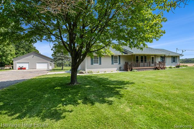 front view picture of 4864 Holmes Road, Goodrich, MI. 48438