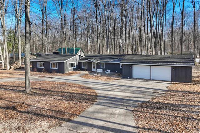 front view picture of 5354 E Shore Drive, Kalkaska, MI. 49646