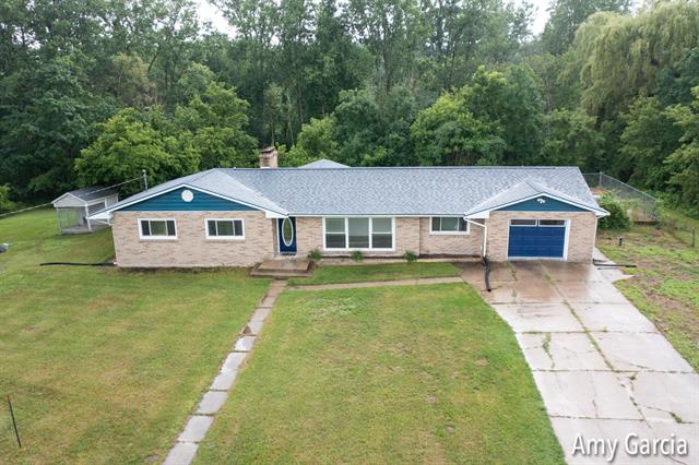 front view picture of 88 Ostman Street, Sparta, MI. 49345