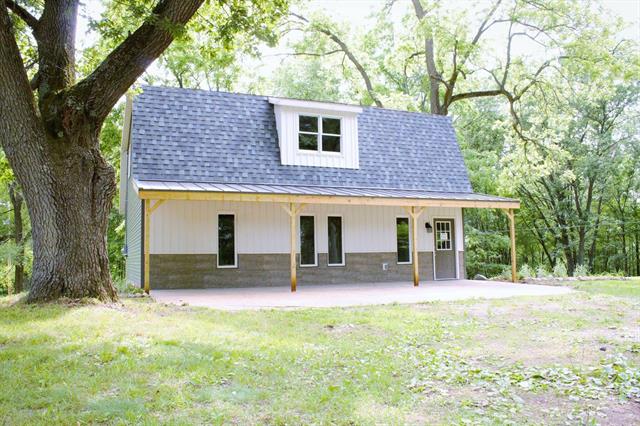 front view picture of 11393 Podunkne  Avenue, Greenville, MI. 48838