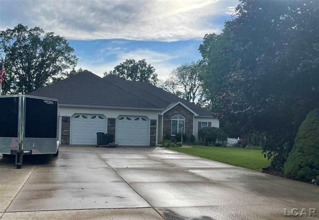 front view picture of 11061 Village Lane, Clinton, MI. 49236
