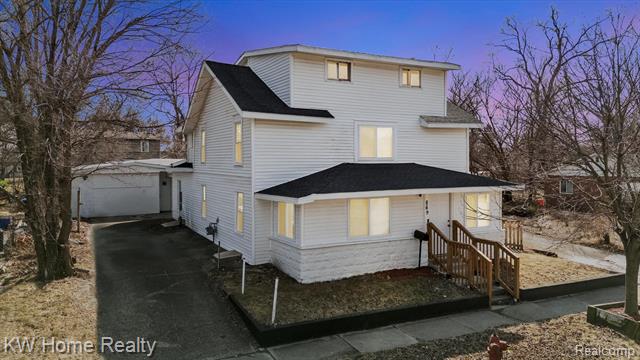 front view picture of 869 Monroe Street, Ypsilanti, MI. 48197