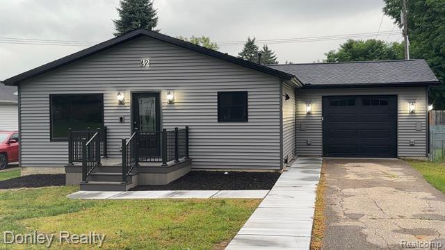 front view picture of 42 Hartley Street, Lapeer, MI. 48446