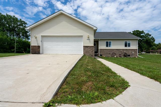 front view picture of 48373 Jefferson Avenue, New Baltimore, MI. 48047