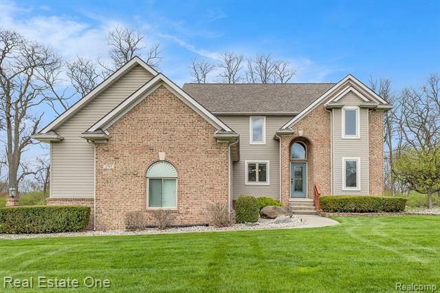 front view picture of 1765 Mist Wood Drive, Howell, MI. 48843