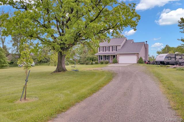 front view picture of 726 Brown City Road, Imlay City, MI. 48444
