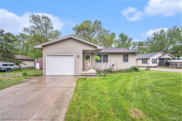 front view picture of 9582 Palmer Avenue, Whitmore Lake, MI. 48189