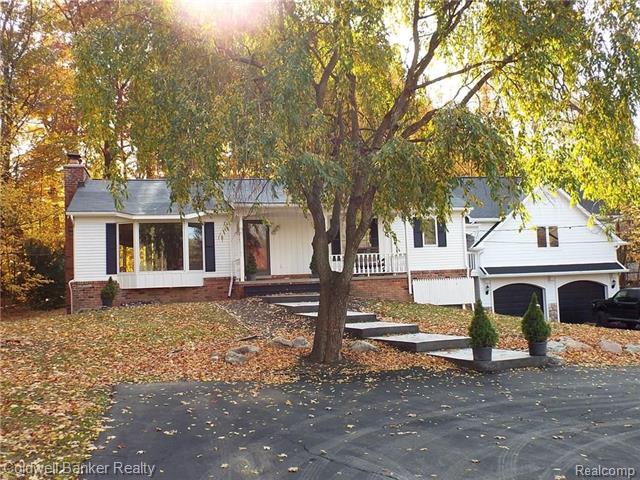 front view picture of 631 Fairbrook Street, Northville, MI. 48167