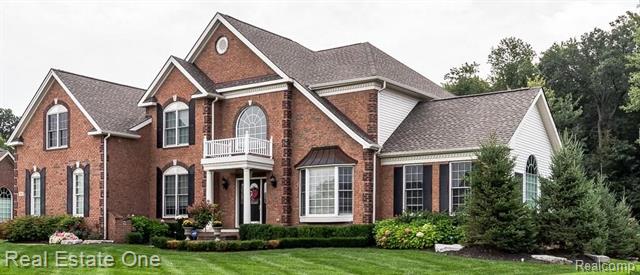 front view picture of 561 Kingstone Court, Oakland, MI. 48363