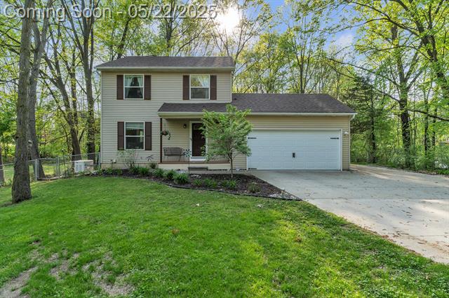 front view picture of 6550 Avon Drive, Brighton, MI. 48116