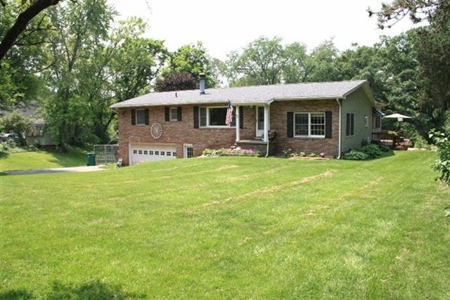 front view picture of 8099 Huron River Drive, Dexter, MI. 48130