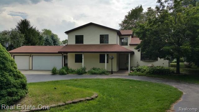 front view picture of 12394 Coolidge Road, Goodrich, MI. 48438