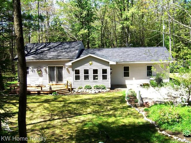 front view picture of 305 Maplewood Drive, Bellaire, MI. 49615