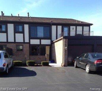 front view picture of 303 Country Club Drive, Saint Clair Shores, MI. 48082