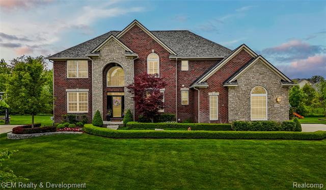front view picture of 52486 Aspen Drive, South Lyon, MI. 48178