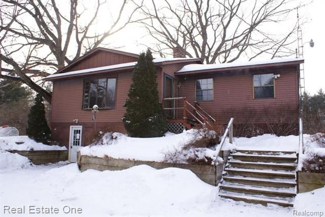 front view picture of 3889 Burnside Road, Otter Lake, MI. 48464