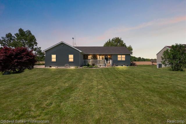 front view picture of 1129 E Coulter Road, Lapeer, MI. 48446