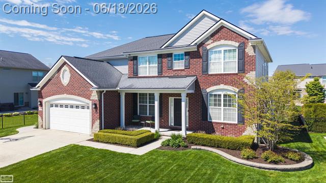 front view picture of 48231 Long Leaf Drive, Macomb, MI. 48044