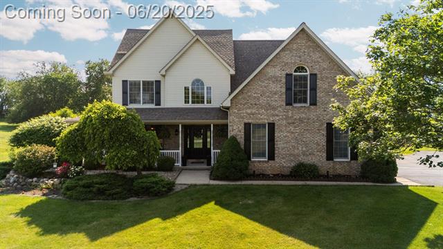 front view picture of 9860 Wood Bend Drive, Saline, MI. 48176